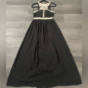 Love Point dress size medium. Color black and cream.